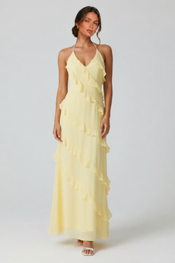 Women's halter neck ruffle maxi dress in a flowing full-length silhouette with soft ruffle detailing, lightweight fabric, and an elegant evening design.