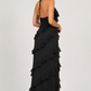 Women's halter neck ruffle maxi dress in a flowing full-length silhouette with soft ruffle detailing, lightweight fabric, and an elegant evening design.