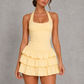 Women's halter ruffle mini dress featuring a corset-inspired fitted bodice, open back, layered ruffle skirt, and feminine flared silhouette, perfect for summer parties, wedding guests, and special occasions.