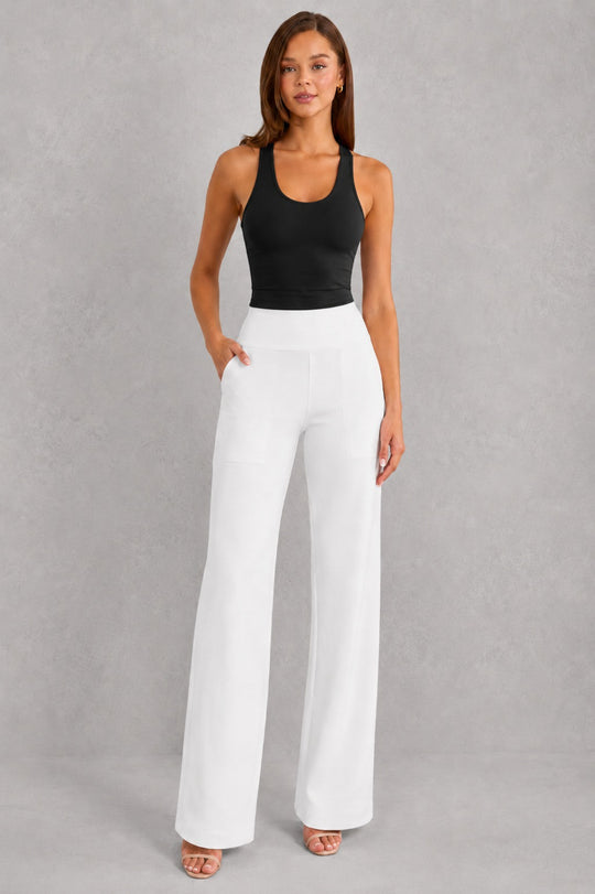 Women's high-waist straight-leg stretch trousers in smooth fabric with elastic waistband and side pockets, offering a flattering tailored fit and all-day comfort.