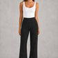 Women's high-waist straight-leg stretch trousers in smooth fabric with elastic waistband and side pockets, offering a flattering tailored fit and all-day comfort.