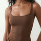 Women's Justina basque waist corset maxi dress featuring a structured boned bodice, square neckline, adjustable wide straps, ruched hip draping, side split, and a fitted floor-length silhouette for elegant evening and occasion wear.