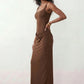 Women's Justina basque waist corset maxi dress featuring a structured boned bodice, square neckline, adjustable wide straps, ruched hip draping, side split, and a fitted floor-length silhouette for elegant evening and occasion wear.