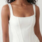 Women's Justina basque waist corset maxi dress featuring a structured boned bodice, square neckline, adjustable wide straps, ruched hip draping, side split, and a fitted floor-length silhouette for elegant evening and occasion wear.