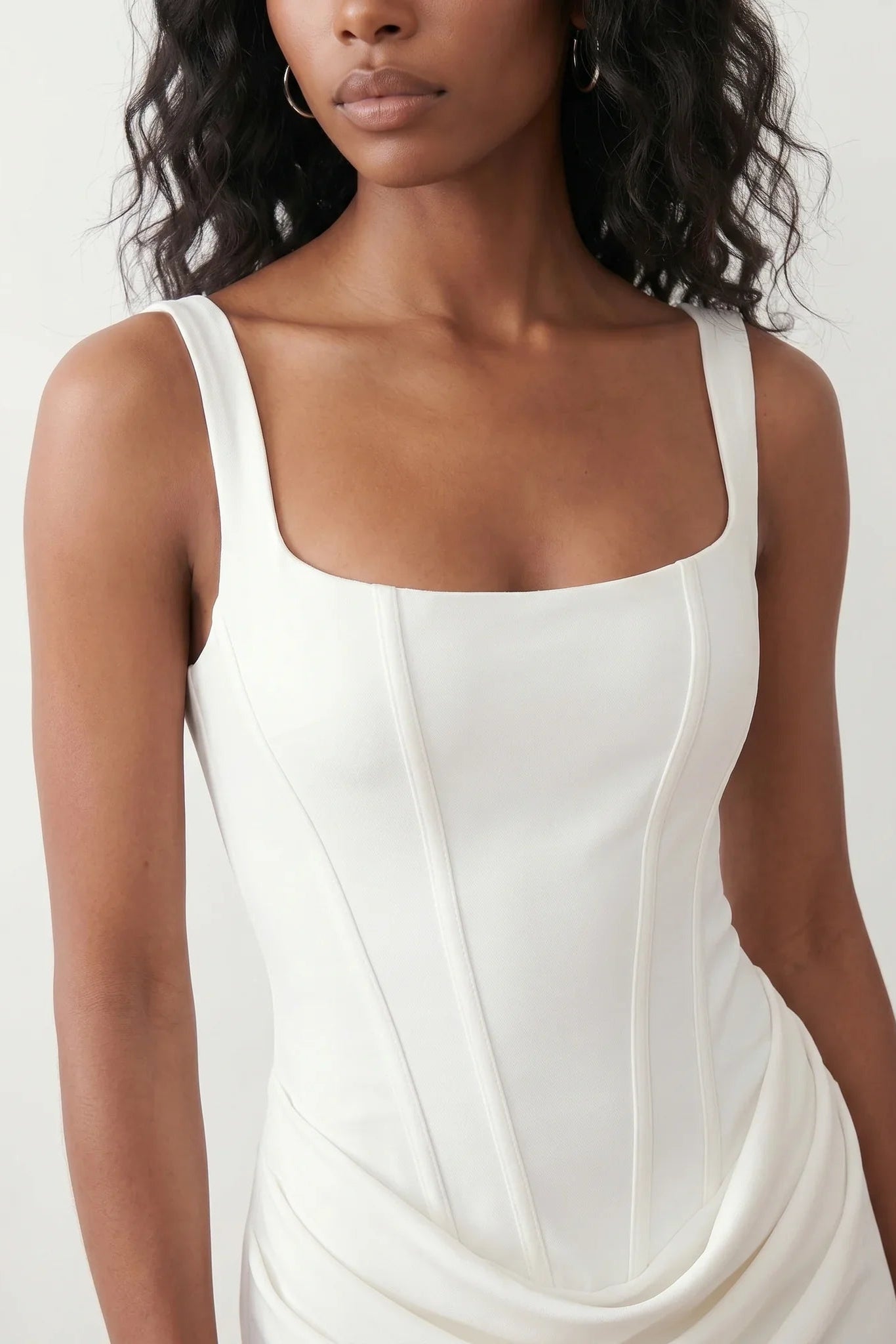 Women's Justina basque waist corset maxi dress featuring a structured boned bodice, square neckline, adjustable wide straps, ruched hip draping, side split, and a fitted floor-length silhouette for elegant evening and occasion wear.