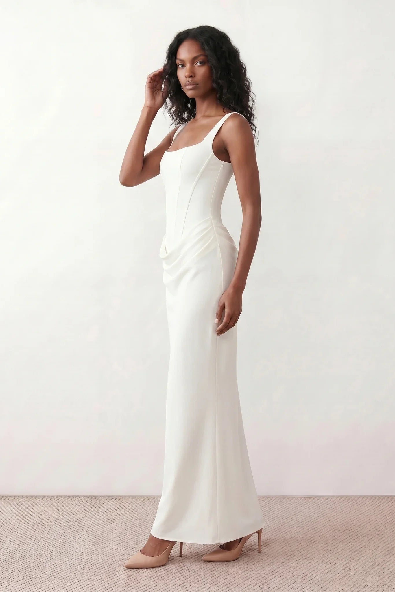 Women's Justina basque waist corset maxi dress featuring a structured boned bodice, square neckline, adjustable wide straps, ruched hip draping, side split, and a fitted floor-length silhouette for elegant evening and occasion wear.