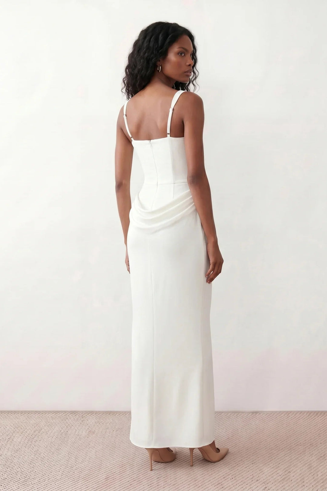 Women's Justina basque waist corset maxi dress featuring a structured boned bodice, square neckline, adjustable wide straps, ruched hip draping, side split, and a fitted floor-length silhouette for elegant evening and occasion wear.
