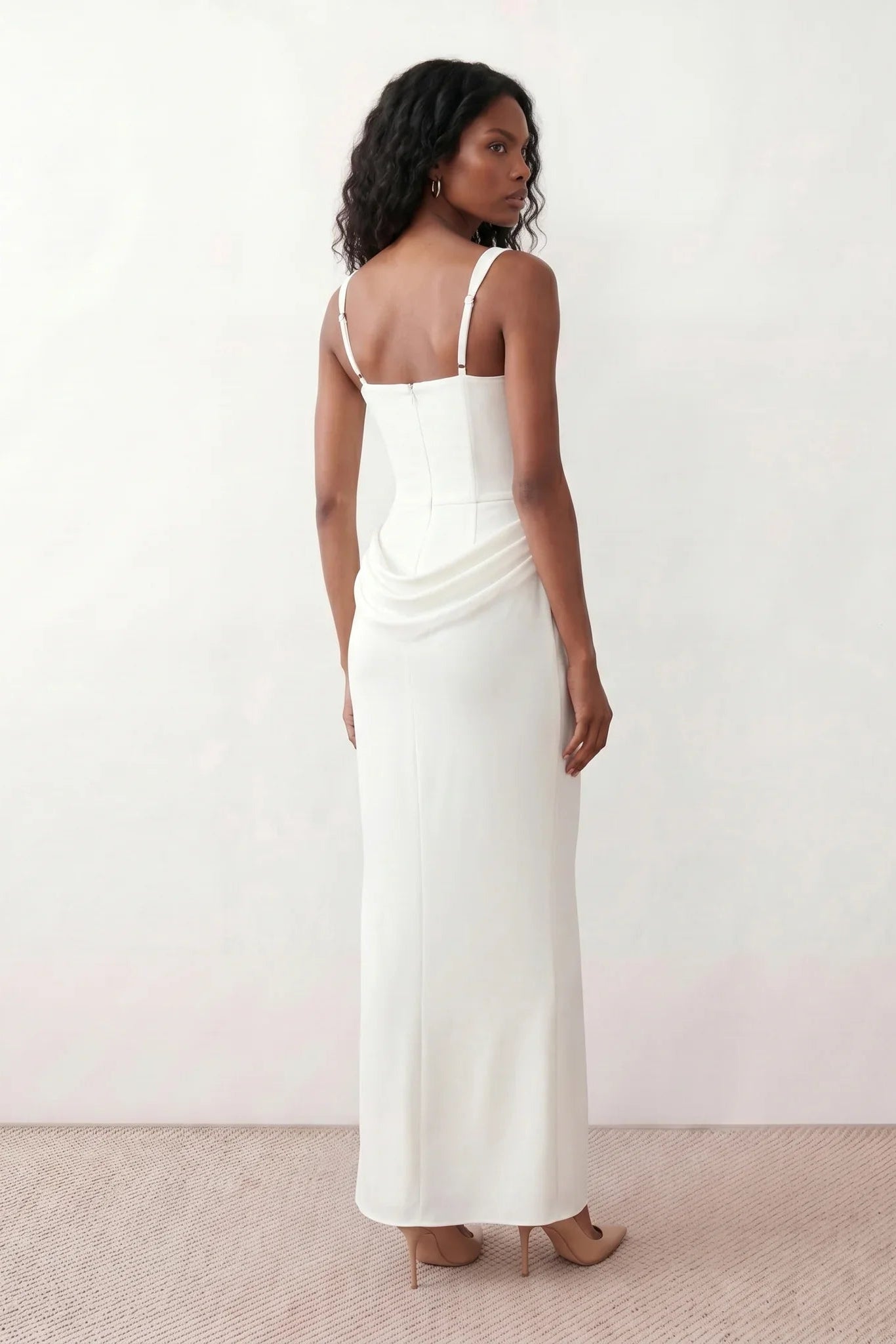 Women's Justina basque waist corset maxi dress featuring a structured boned bodice, square neckline, adjustable wide straps, ruched hip draping, side split, and a fitted floor-length silhouette for elegant evening and occasion wear.