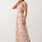 Woman wearing the Giedre Lace-Up A-Line Midi Dress featuring a deep V-neckline, ruffle shoulder sleeves, side waist cut-outs, adjustable lace-up open back and a flowing A-line midi skirt, ideal for weddings, race days and special occasions.