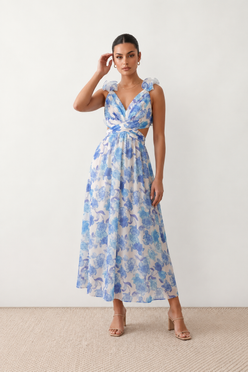 Woman wearing the Giedre Lace-Up A-Line Midi Dress featuring a deep V-neckline, ruffle shoulder sleeves, side waist cut-outs, adjustable lace-up open back and a flowing A-line midi skirt, ideal for weddings, race days and special occasions.