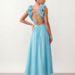 Woman wearing the Giedre Lace-Up A-Line Midi Dress featuring a deep V-neckline, ruffle shoulder sleeves, side waist cut-outs, adjustable lace-up open back and a flowing A-line midi skirt, ideal for weddings, race days and special occasions.