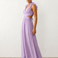 Woman wearing the Giedre Lace-Up A-Line Midi Dress featuring a deep V-neckline, ruffle shoulder sleeves, side waist cut-outs, adjustable lace-up open back and a flowing A-line midi skirt, ideal for weddings, race days and special occasions.