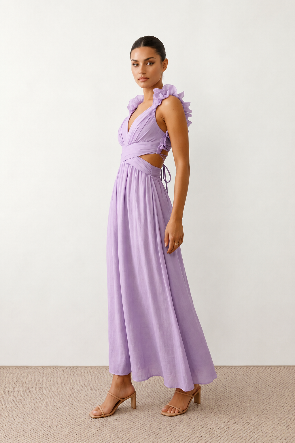Woman wearing the Giedre Lace-Up A-Line Midi Dress featuring a deep V-neckline, ruffle shoulder sleeves, side waist cut-outs, adjustable lace-up open back and a flowing A-line midi skirt, ideal for weddings, race days and special occasions.