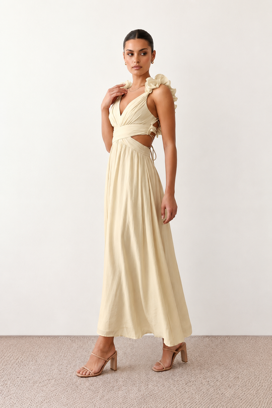 Woman wearing the Giedre Lace-Up A-Line Midi Dress featuring a deep V-neckline, ruffle shoulder sleeves, side waist cut-outs, adjustable lace-up open back and a flowing A-line midi skirt, ideal for weddings, race days and special occasions.