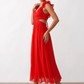 Woman wearing the Giedre Lace-Up A-Line Midi Dress featuring a deep V-neckline, ruffle shoulder sleeves, side waist cut-outs, adjustable lace-up open back and a flowing A-line midi skirt, ideal for weddings, race days and special occasions.