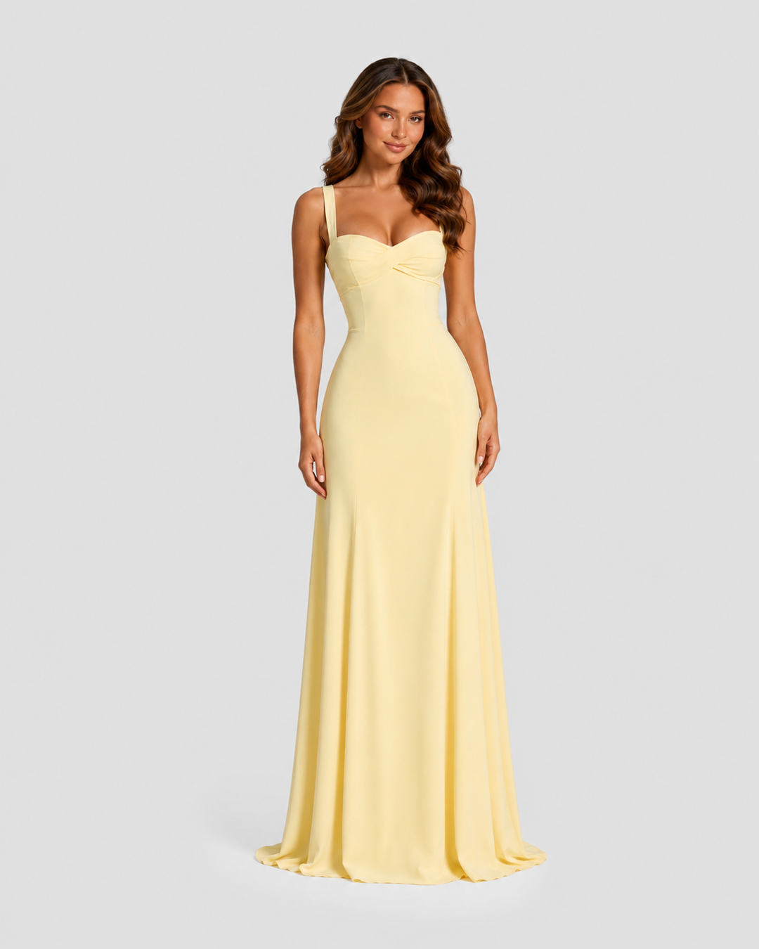 Women's chiffon maxi dress with sweetheart neckline, pleated underwired cups, fitted bodice, lace-up back, and flowing flared skirt for formal occasions.