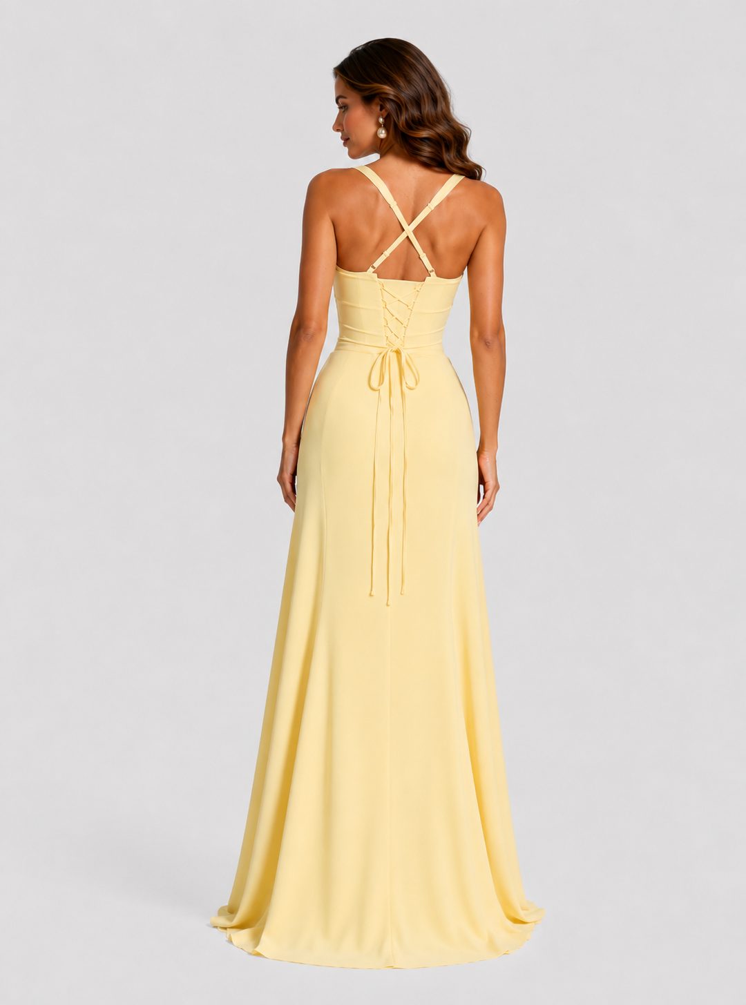 Women's chiffon maxi dress with sweetheart neckline, pleated underwired cups, fitted bodice, lace-up back, and flowing flared skirt for formal occasions.