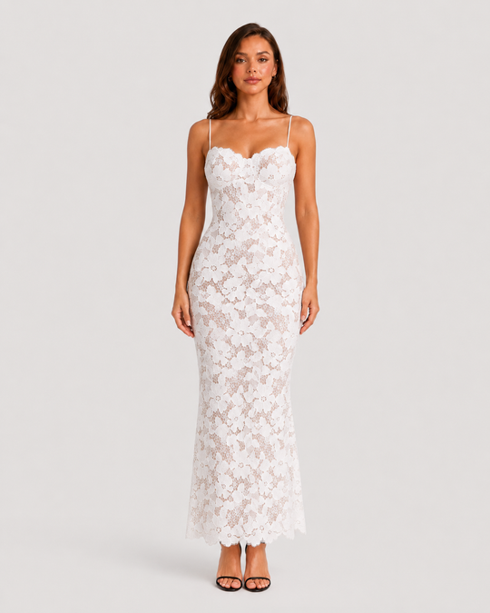 Women's floral embroidered maxi dress featuring scalloped trim, fitted bodice, lace-up back, and flowing skirt for elegant occasion wear.