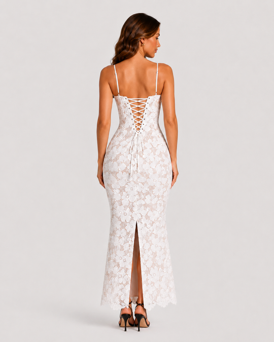 Women's floral embroidered maxi dress featuring scalloped trim, fitted bodice, lace-up back, and flowing skirt for elegant occasion wear.
