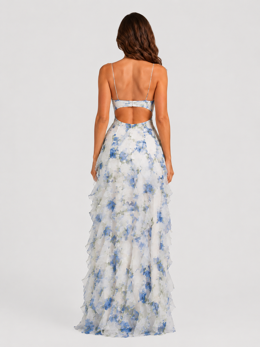 Women's floral ruffle maxi dress with corset-inspired bodice, adjustable straps, and flowing layered chiffon-look skirt in a feminine occasionwear silhouette.