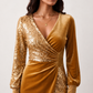 Women's Lidija sequined ruched mini dress with a wrap-style V-neckline, long sleeves, fitted silhouette, front ruching, asymmetric hem, and subtle front slit, ideal for parties, cocktail events, and festive occasions.
