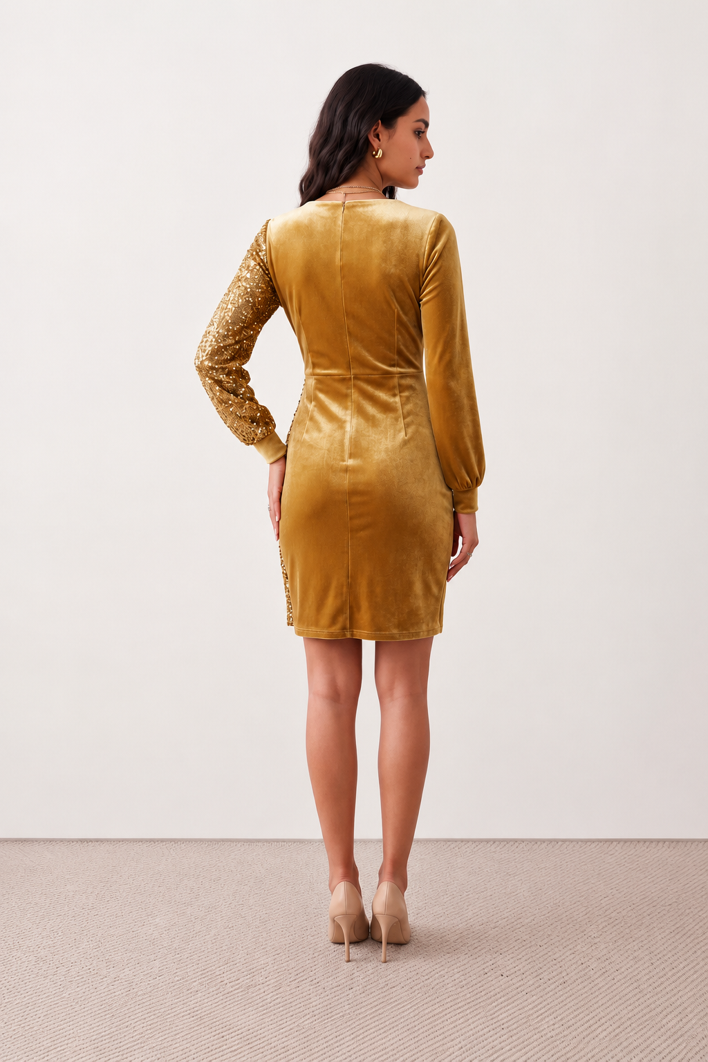 Women's Lidija sequined ruched mini dress with a wrap-style V-neckline, long sleeves, fitted silhouette, front ruching, asymmetric hem, and subtle front slit, ideal for parties, cocktail events, and festive occasions.