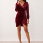 Women's Lidija sequined ruched mini dress with a wrap-style V-neckline, long sleeves, fitted silhouette, front ruching, asymmetric hem, and subtle front slit, ideal for parties, cocktail events, and festive occasions.