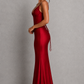 Women's satin maxi dress with a structured corset bodice, pleated cups, fan-shaped shoulder straps, adjustable lace-up back, and a flowing bias-cut skirt, designed for elegant evening occasions and formal events.