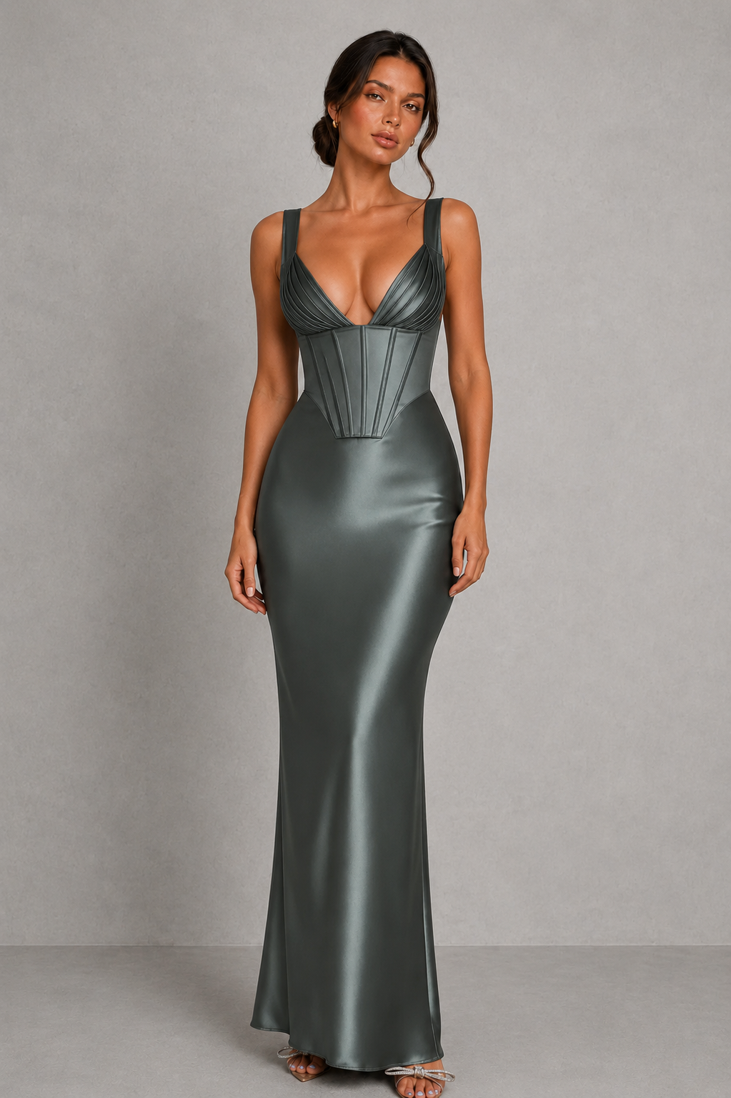 Women's satin maxi dress with a structured corset bodice, pleated cups, fan-shaped shoulder straps, adjustable lace-up back, and a flowing bias-cut skirt, designed for elegant evening occasions and formal events.