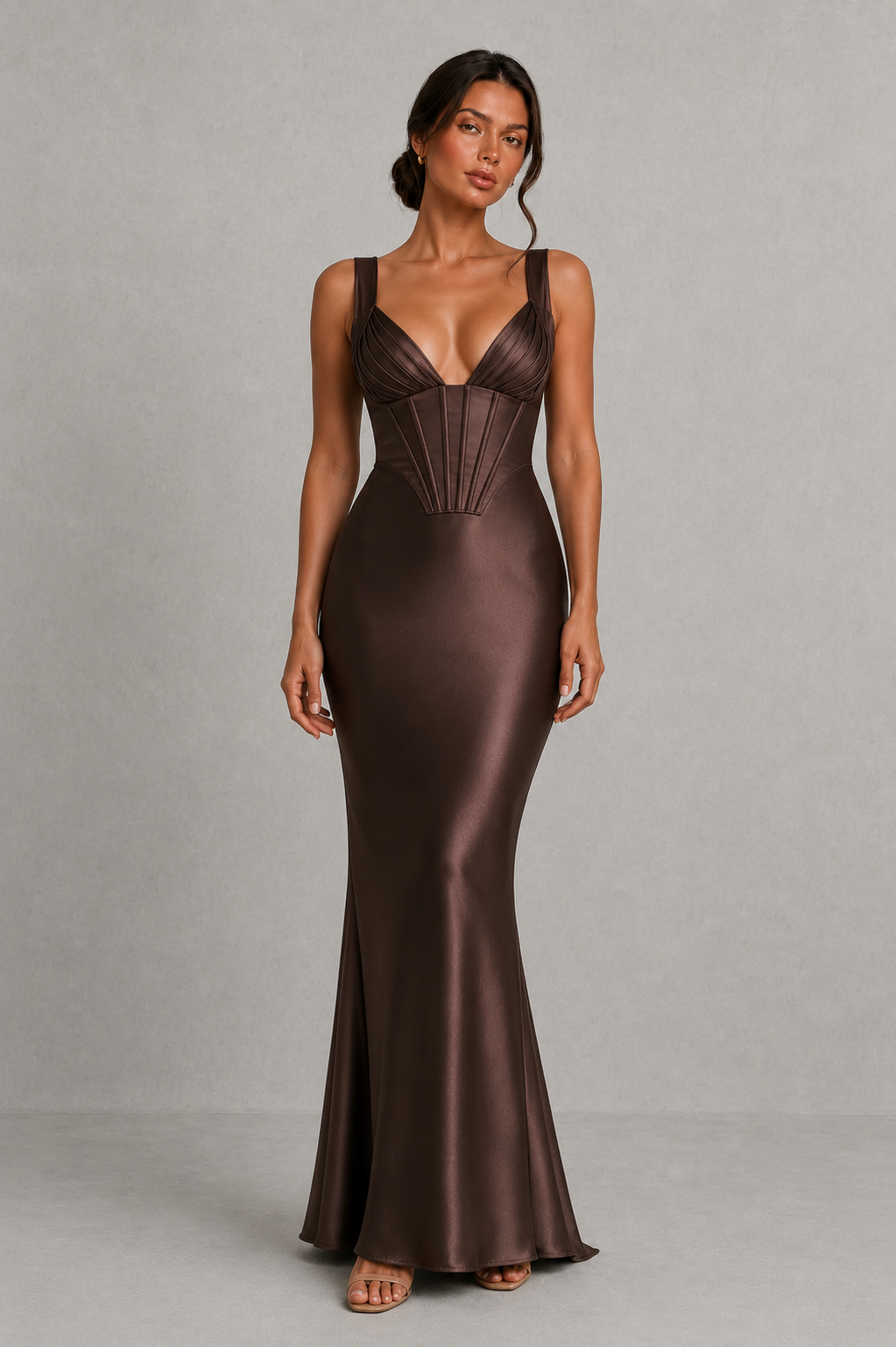 Women's satin maxi dress with a structured corset bodice, pleated cups, fan-shaped shoulder straps, adjustable lace-up back, and a flowing bias-cut skirt, designed for elegant evening occasions and formal events.