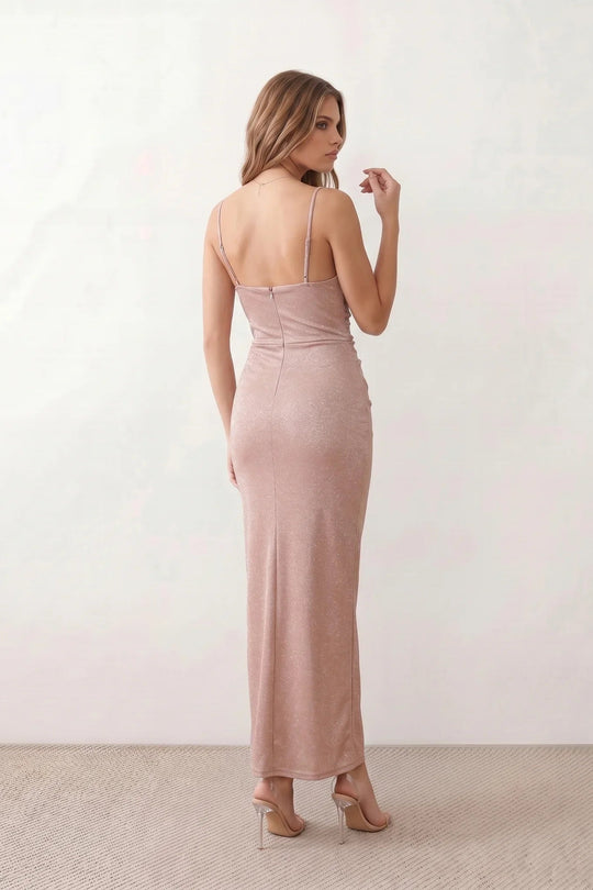 Woman wearing the metallic cowl neck mermaid maxi dress with adjustable spaghetti straps, a ruched bodice, low open back, and shimmering figure-hugging silhouette, perfect for weddings, black-tie events, proms, and formal evening occasions.