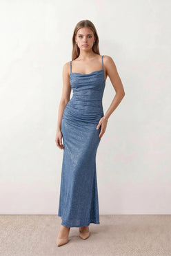 Woman wearing the metallic cowl neck mermaid maxi dress with adjustable spaghetti straps, a ruched bodice, low open back, and shimmering figure-hugging silhouette, perfect for weddings, black-tie events, proms, and formal evening occasions.