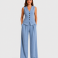 Women's sleeveless tailored waistcoat and wide-leg trousers co-ord set in breathable linen-look fabric with button-front detail and relaxed tailored fit.