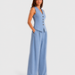 Women's sleeveless tailored waistcoat and wide-leg trousers co-ord set in breathable linen-look fabric with button-front detail and relaxed tailored fit.