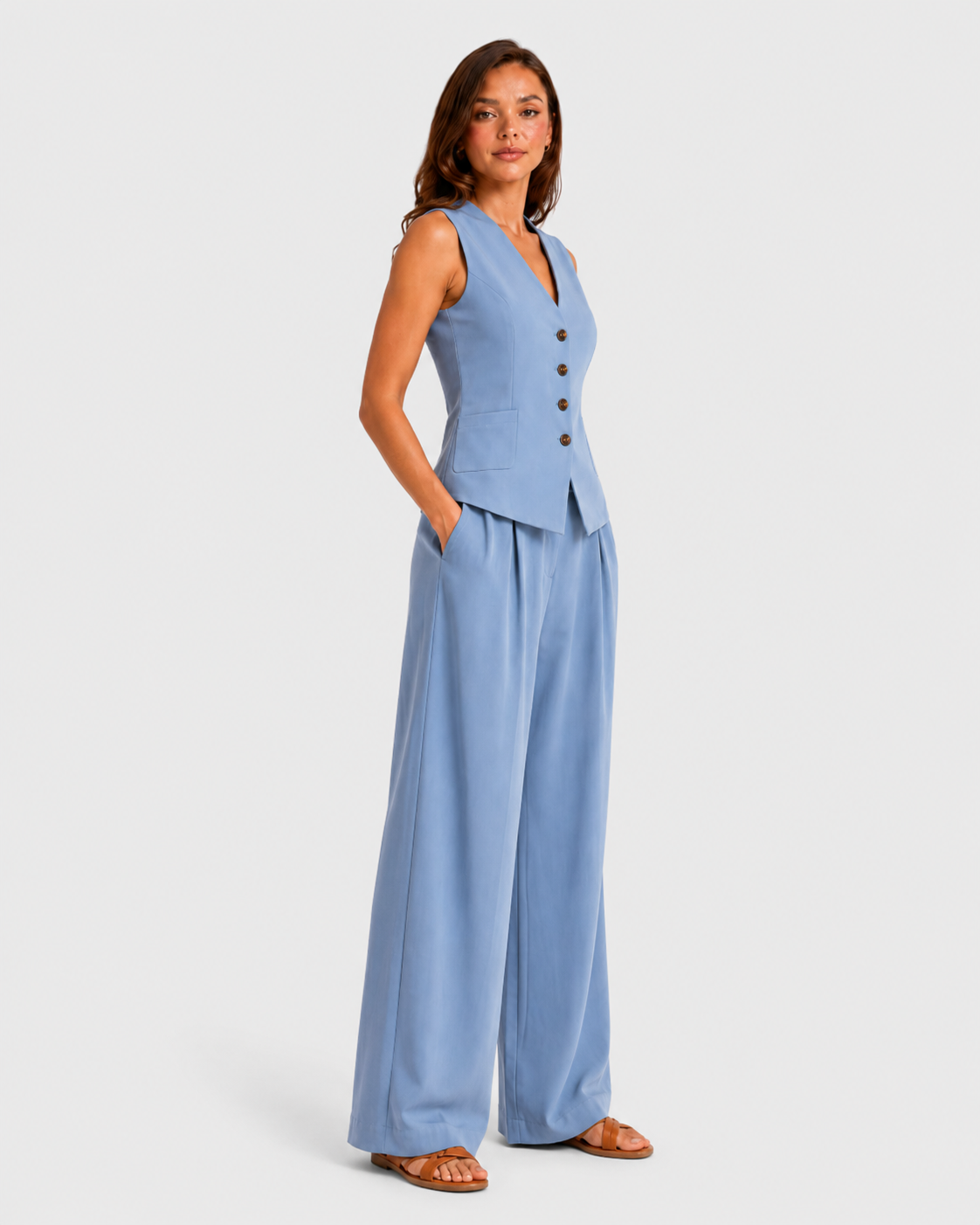 Women's sleeveless tailored waistcoat and wide-leg trousers co-ord set in breathable linen-look fabric with button-front detail and relaxed tailored fit.