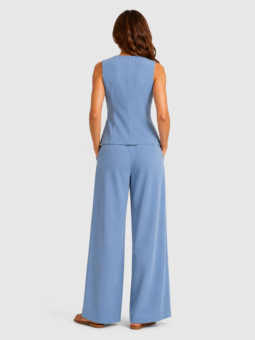 Women's sleeveless tailored waistcoat and wide-leg trousers co-ord set in breathable linen-look fabric with button-front detail and relaxed tailored fit.