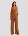 Women's sleeveless tailored waistcoat and wide-leg trousers co-ord set in breathable linen-look fabric with button-front detail and relaxed tailored fit.