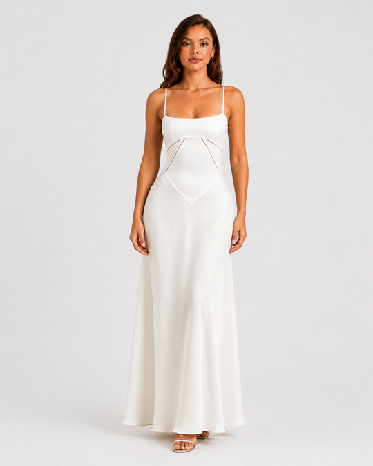 Woman wearing an elegant bustier maxi gown with delicate straps, fitted bodice, and flowing full-length skirt designed for formal occasions.