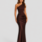 Woman wearing a one-shoulder satin maxi dress with a fitted stretch crepe bodice, asymmetric dropped waist, and elegant draped hip detailing.