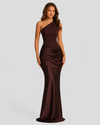 Woman wearing a one-shoulder satin maxi dress with a fitted stretch crepe bodice, asymmetric dropped waist, and elegant draped hip detailing.