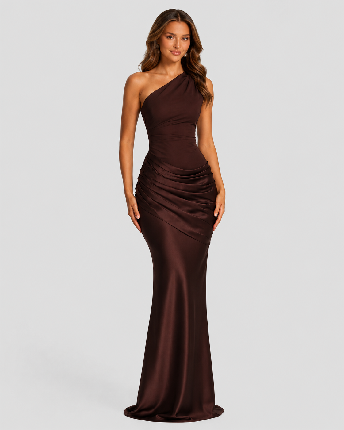 Woman wearing a one-shoulder satin maxi dress with a fitted stretch crepe bodice, asymmetric dropped waist, and elegant draped hip detailing.