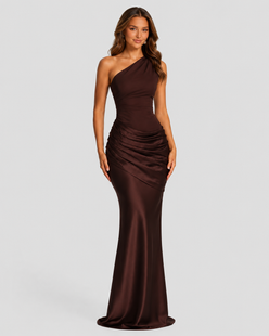 Woman wearing a one-shoulder satin maxi dress with a fitted stretch crepe bodice, asymmetric dropped waist, and elegant draped hip detailing.