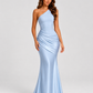 Woman wearing a one-shoulder satin maxi dress with a fitted stretch crepe bodice, asymmetric dropped waist, and elegant draped hip detailing.
