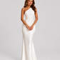 Woman wearing a one-shoulder satin maxi dress with a fitted stretch crepe bodice, asymmetric dropped waist, and elegant draped hip detailing.