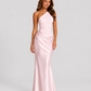 Woman wearing a one-shoulder satin maxi dress with a fitted stretch crepe bodice, asymmetric dropped waist, and elegant draped hip detailing.