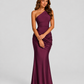Woman wearing a one-shoulder satin maxi dress with a fitted stretch crepe bodice, asymmetric dropped waist, and elegant draped hip detailing.