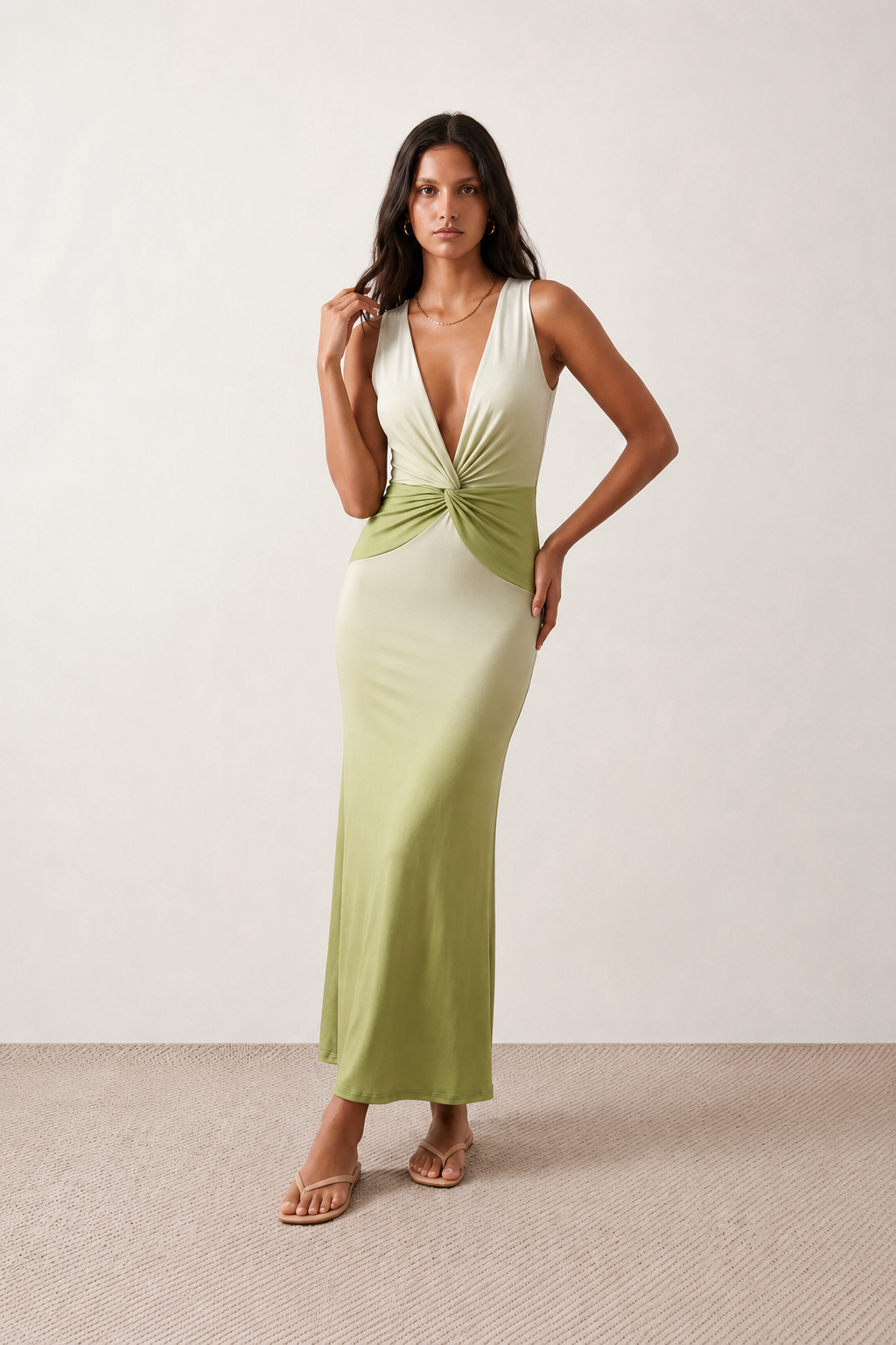 Women's Ariana plunge neck fitted maxi dress in a white-to-sage green ombré gradient, featuring a deep V neckline, twist-front knot waist, ruched bodice, sleeveless bodycon silhouette, mermaid hem, and concealed back zip. An elegant evening gown perfect for weddings, black-tie events, proms, and formal occasions.