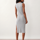 Woman wearing the Raina ribbed fitted midi dress in a sleeveless bodycon design with a round neckline, wide-rib knit texture and elegant side slit, styled as a sophisticated occasion dress.