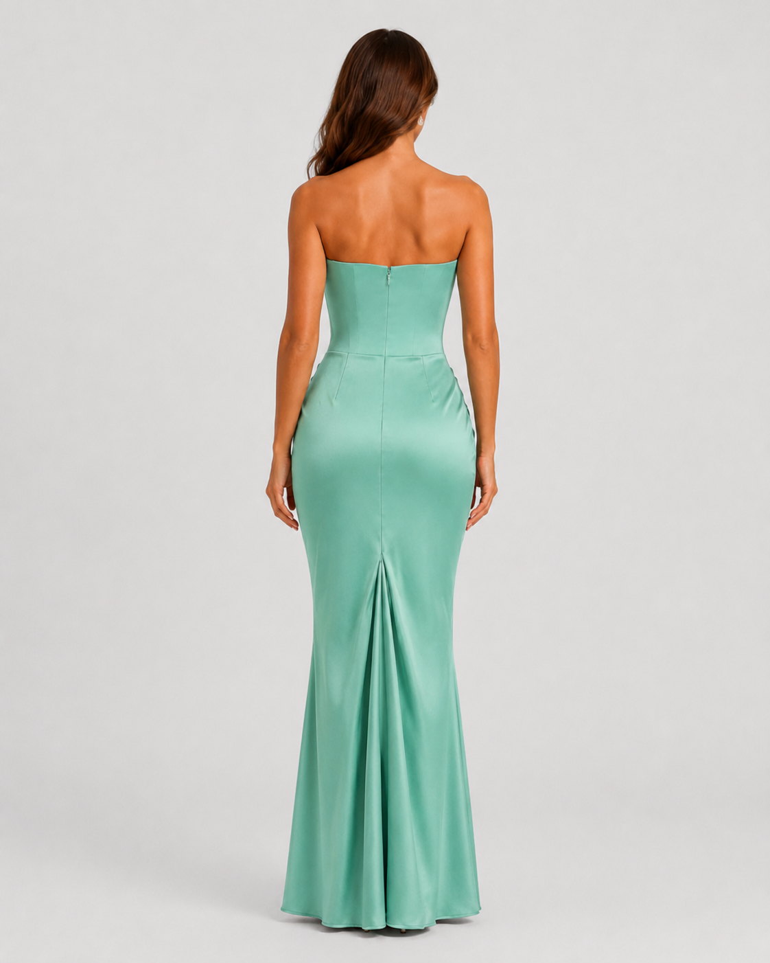 Women's strapless satin gown featuring a draped waist, sculpted fitted silhouette, and elegant floor-length design in a lustrous satin finish.