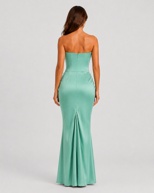 Women's strapless satin gown featuring a draped waist, sculpted fitted silhouette, and elegant floor-length design in a lustrous satin finish.